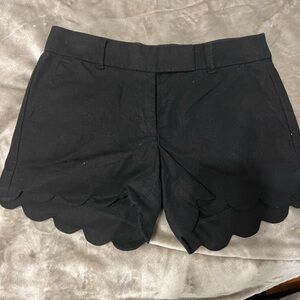 Scalloped black shorts